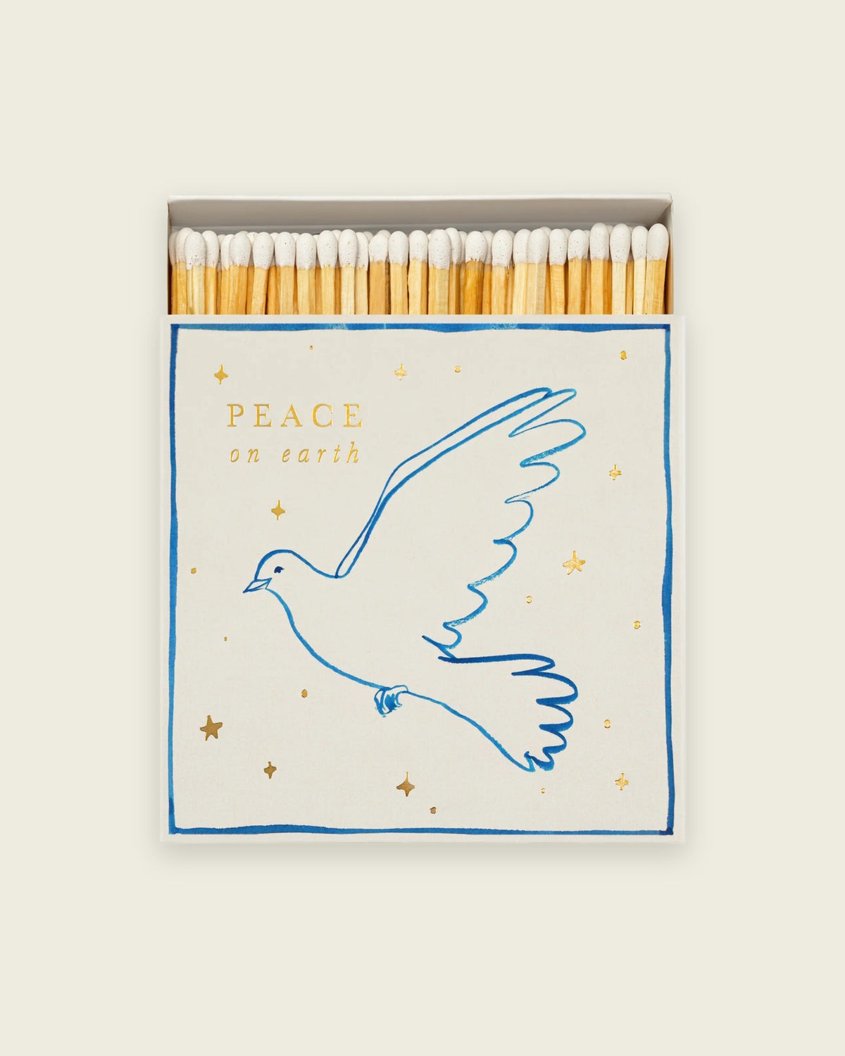 Archivist Peace on Earth matchbox, blue dove and gold stars, open to show the matches